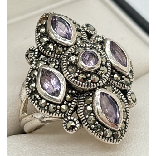 1120 - A silver Gothic style statement ring set with marquise and round cut amethysts and multiple marcasit... 