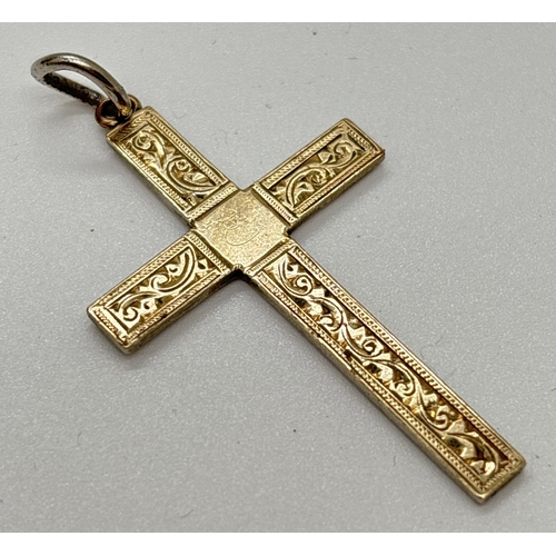 1101 - A vintage 9ct gold on silver cross pendant with engraved design to front. 9ct and silver mark to bac... 