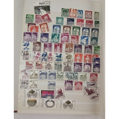 101 - A stamp stock book containing a large collection of British and foreign stamps. Examples of British ... 