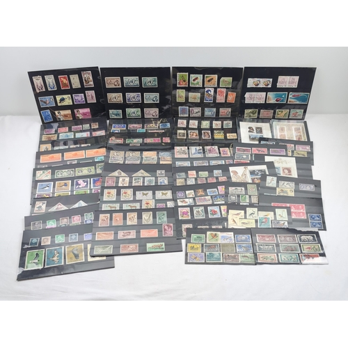 80 - 27 collectors sleeves of world stamps, both franked and unfranked. To include examples from Poland, ... 