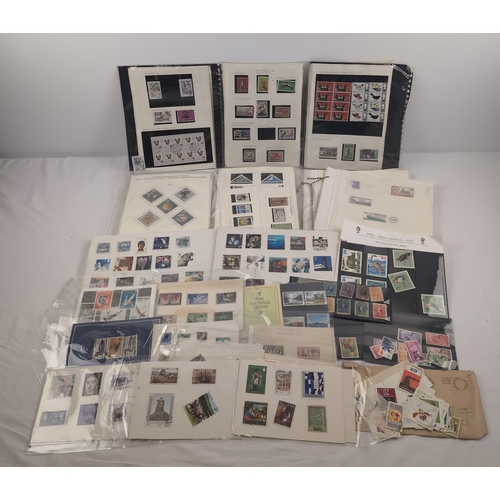 82 - A collection of individual stamp album sheets with various franked and unfranked stamps from around ... 