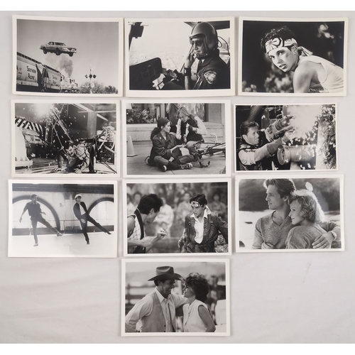 215 - 10 black and white 7 x 5 inch photos of scenes or actors from Hollywood films. Photos comprise: Ralp... 