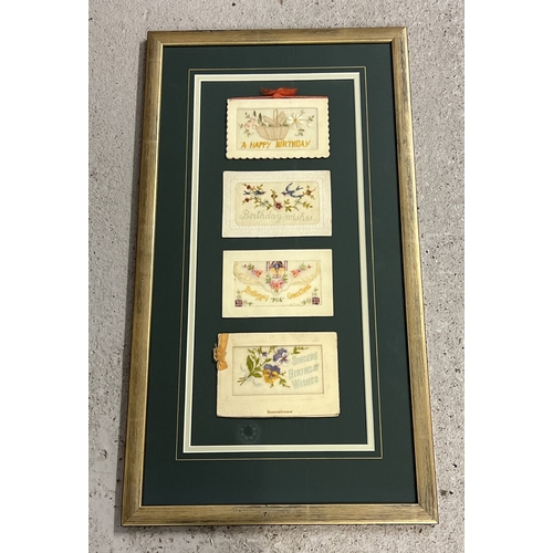 218 - A framed and glazed set of 4 embroidered silk sweetheart birthday greetings cards. Frame size approx... 