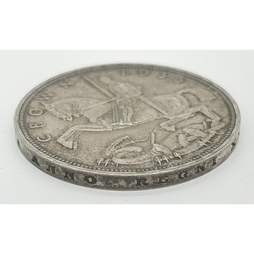 7 - A .500 silver 1935 George V silver jubilee crown with Art Deco George and dragon (rocking horse) to ... 