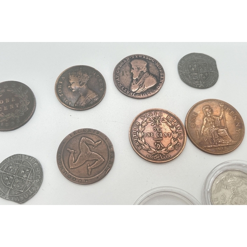 11 - A collection of antique, vintage and reproduction coins. To include a prince of Glamorgan half penny... 