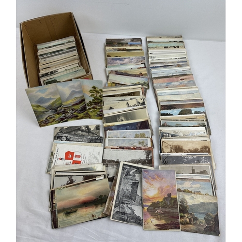 241 - 400 assorted black & white and coloured vintage British postcards to include RP's. In a brown card l... 