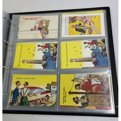 243 - A large postcard album containing approx. 240 assorted vintage humorous postcards, in clear plastic ... 