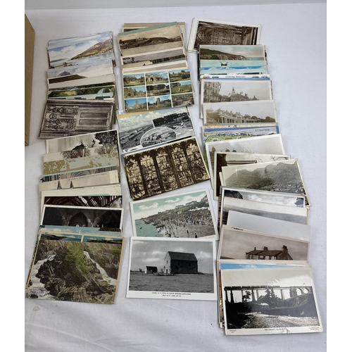 247 - 400 assorted Edwardian & vintage black & white and coloured British postcards, to include RP's. In a... 