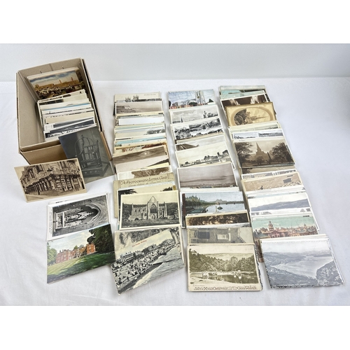 248 - 400 assorted Edwardian & vintage black & white and coloured British postcards, to include RP's. In a... 