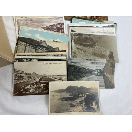 249 - 400 assorted Edwardian & vintage black & white and coloured British postcards, to include many coast... 