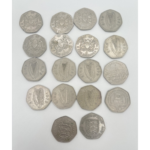 19 - A collection of vintage 50p coins and Kenyan 5 shilling coins. To include Irish 50 pences, Isle Of M... 