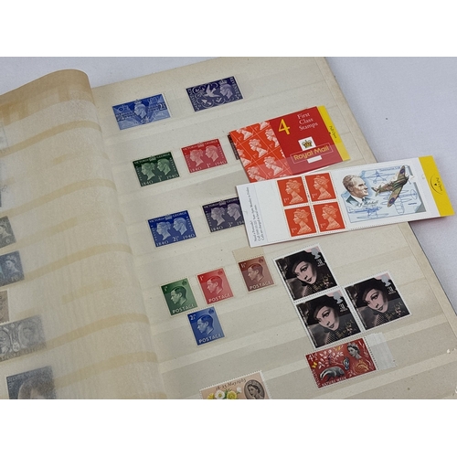 64 - A vintage album containing British used and unused stamps. album contains 4 x 1st class stamps books... 