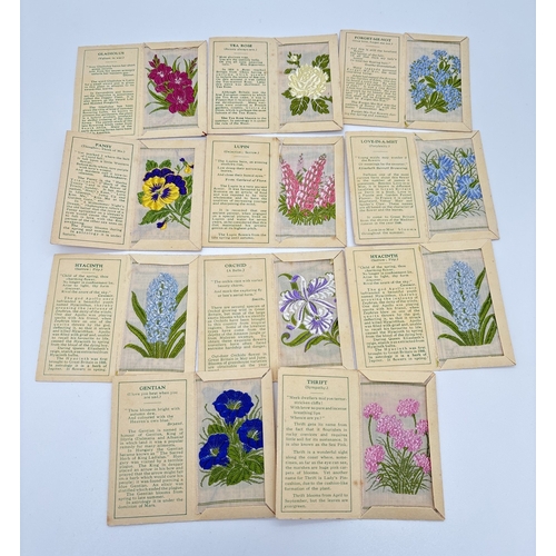 125 - 11 Kensitas silk Cigarette cards of flowers in individual cards wallets, each with information about... 