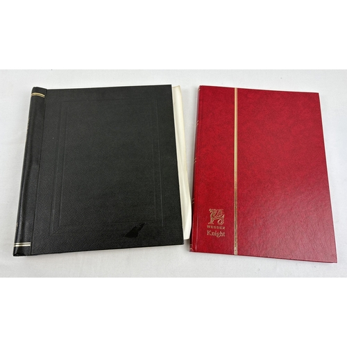 67 - A red Wessex Knight stamp album and a black Barclay Classic Stamp Album. Both containing a small amo... 