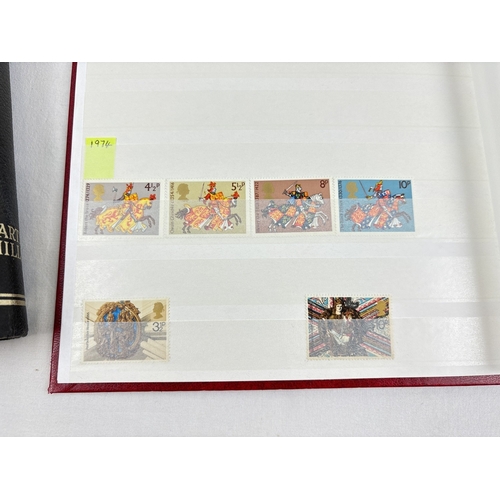 67 - A red Wessex Knight stamp album and a black Barclay Classic Stamp Album. Both containing a small amo... 