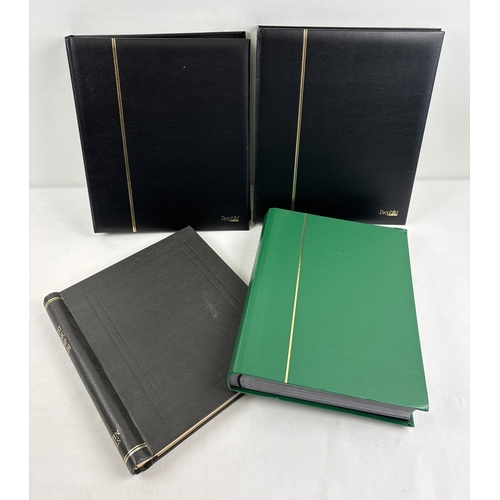 68 - 4 empty stamp stock books and binders, to include a black Barclay classic stamp album.