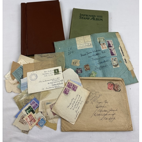 70 - 2 early to mid 20th century stamp albums containing assorted world stamps, together with a quantity ... 