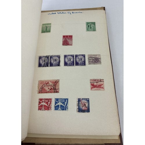 70 - 2 early to mid 20th century stamp albums containing assorted world stamps, together with a quantity ... 