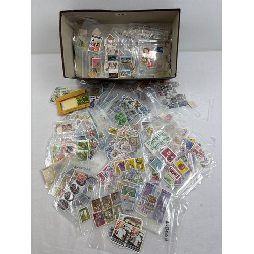 71 - A box containing a large quantity of assorted vintage world stamps, mostly used.