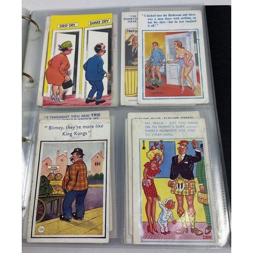 256 - An album of 90+ assorted vintage humorous/saucy postcards to include Comicard, Constance, Bamforth's... 