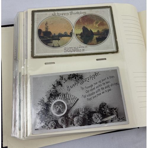 257 - A modern album containing 200 assorted Victorian, Edwardian and vintage postcard style greetings car... 