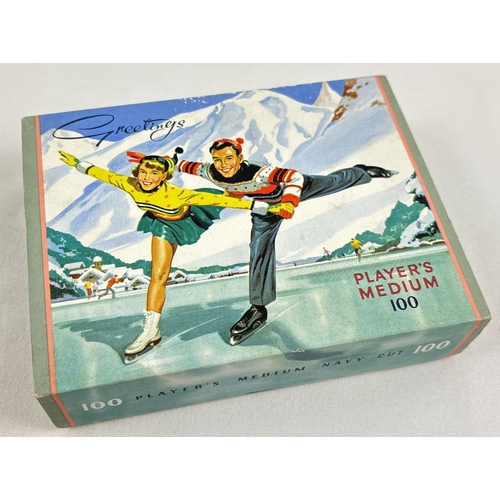 174 - A full box of 100 vintage 1950's Player's Medium Navy Cut cigarettes, sealed and with Christmas gift... 