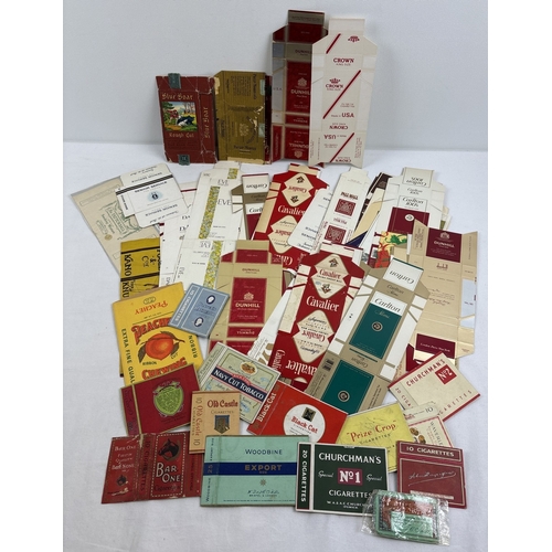 176 - A collection of assorted vintage cigarette packaging, labels, flattened boxes and ephemera. Part of ... 