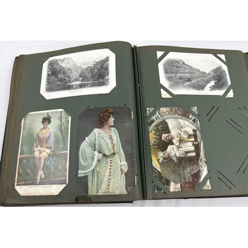 184 - A late Victorian postcard album containing 130 assorted postcards and greetings cards. To include Br... 