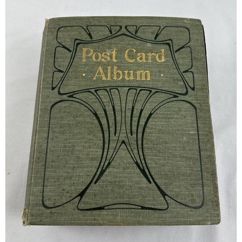 258 - A large Art Nouveau postcard album containing 380 assorted British postcards, to include RP's. Green... 