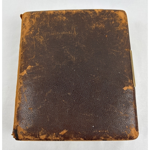 190 - A Victorian leather bound photograph album containing cabinet cards of Allan James Crawford Farie th... 