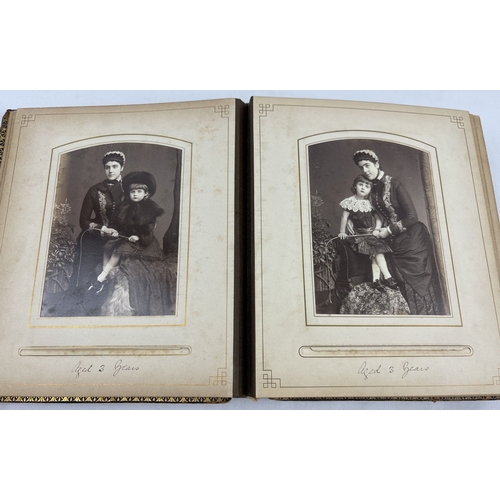 190 - A Victorian leather bound photograph album containing cabinet cards of Allan James Crawford Farie th... 