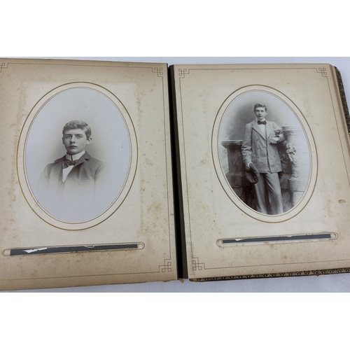 190 - A Victorian leather bound photograph album containing cabinet cards of Allan James Crawford Farie th... 