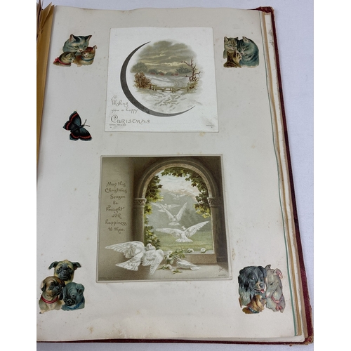 196 - A Victorian leather bound scrap album containing assorted greetings cards and scraps, dated 1881 ins... 