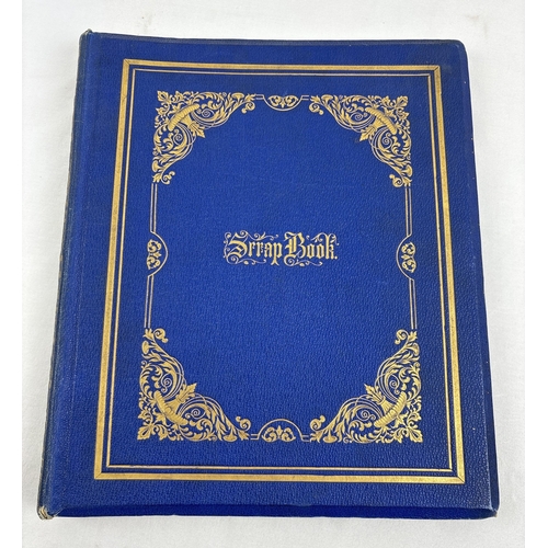 197 - A late Victorian blue coloured scrap album with gilt detailing and lettering to spine and covers. Co... 