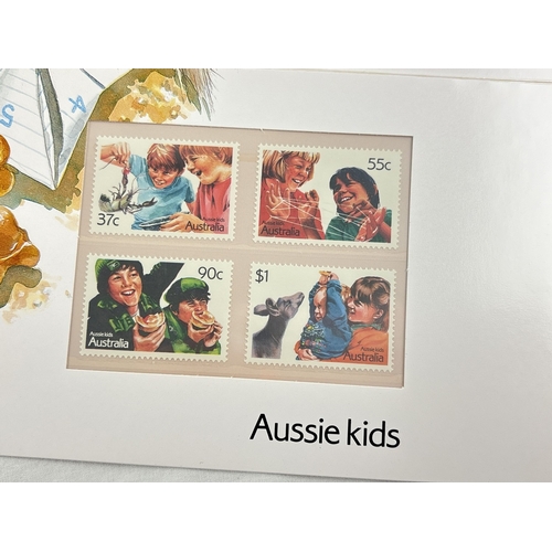 79 - 25 assorted Australia Post mint stamp presentation packs from the 1980's & early 90's together with ... 