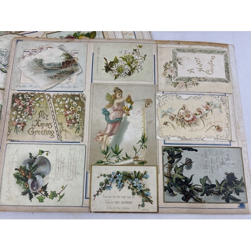 208 - A collection of assorted Victorian scrap book loose pages containing assorted scraps & greetings car... 