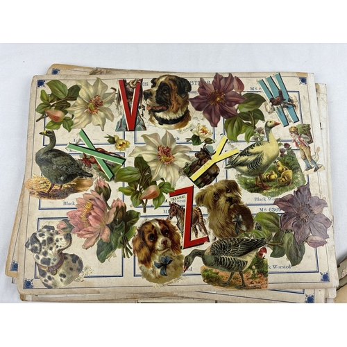 208 - A collection of assorted Victorian scrap book loose pages containing assorted scraps & greetings car... 