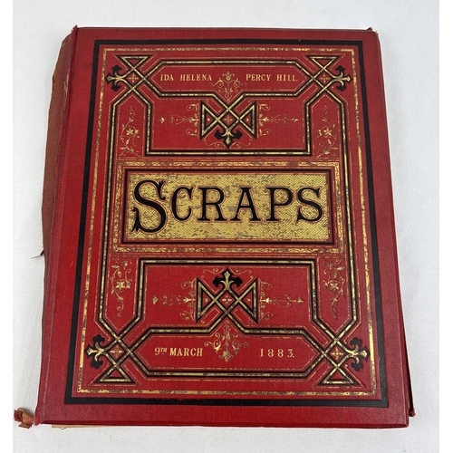 214 - A Victorian scrap book, red cloth bound cover with gilt detail, dated 1883 - damage to spine, covers... 