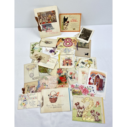 230 - A box of 140 assorted early 20th century greetings cards in varying sizes, styles and designs.