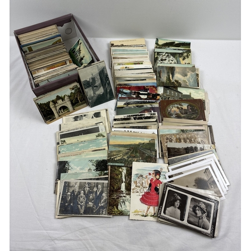 275 - A box containing 780 assorted Edwardian and vintage British postcards and greetings cards. To includ... 