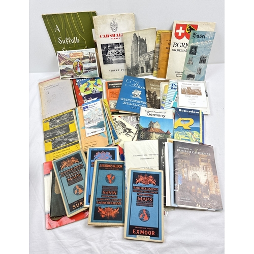 231 - A box of assorted vintage ephemera relating to travel to include maps, travel guide leaflets, postca... 