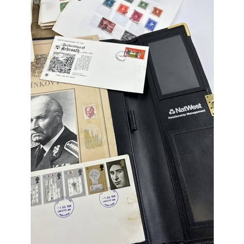 43 - A vintage lever arch file containing assorted world stamps, together with an Australia Post 2000 Oly... 