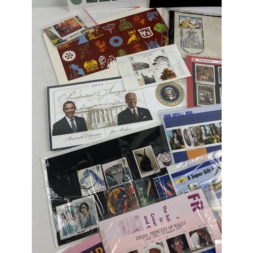 49 - A box of British and foreign stamp sets, panes and blocks of stamps. To include USA Rosa Parks self ... 