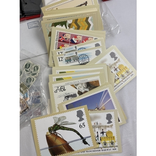 76 - A collection of assorted vintage stamps, first day covers, PHQ cards and stamped envelopes. Lot incl... 