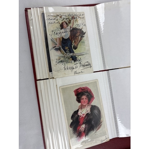 237 - An album containing 100 assorted Victorian & Edwardian greetings and sweetheart postcards.