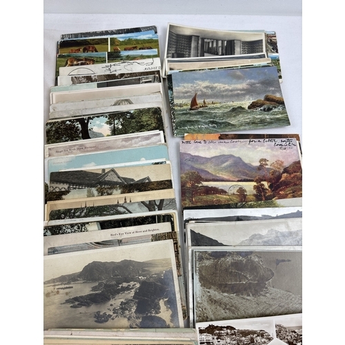 249 - 400 assorted Edwardian & vintage black & white and coloured British postcards, to include many coast... 