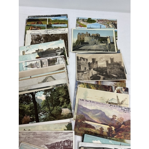 249 - 400 assorted Edwardian & vintage black & white and coloured British postcards, to include many coast... 