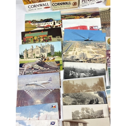 267 - 50+ assorted vintage postcards relating to vehicles and transport. To include photographic cards of ... 