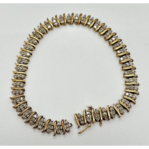 1015 - A 9ct gold and diamond 8 inch bracelet in need of repair. Each link comprises S design yellow gold a... 