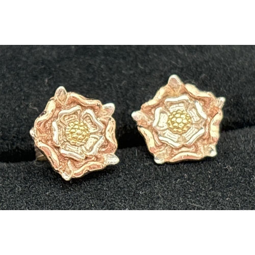 1029 - 3 pairs of silver stud style earrings. A pair of Tudor rose earrings, a pair of large knot style ear... 